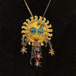 "Lunch at the Ritz" Here Comes the Sun brooch/necklace